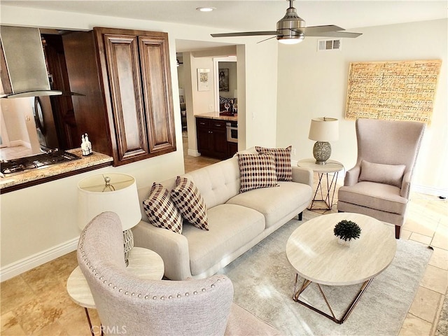 living room with ceiling fan