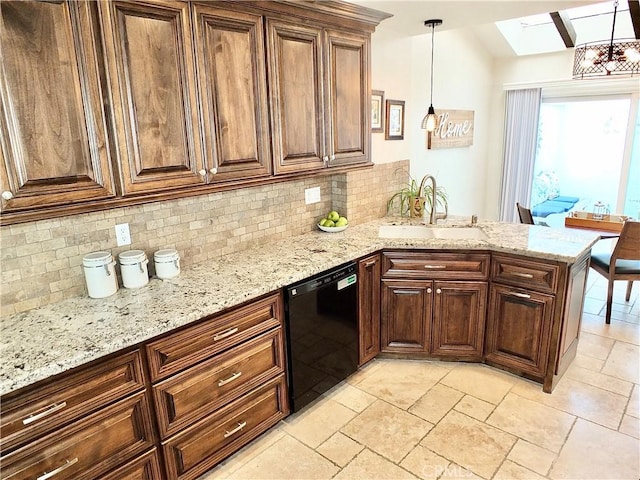 kitchen featuring kitchen peninsula, black dishwasher, decorative backsplash, decorative light fixtures, and sink