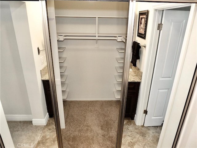 closet featuring baseboard heating