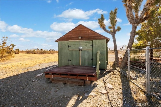 view of outdoor structure with a rural view