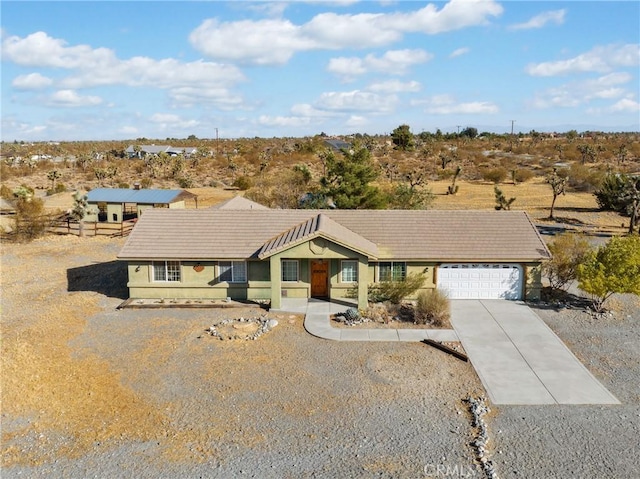 ranch-style home with a garage