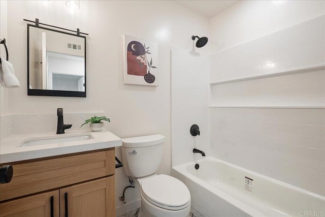 full bathroom featuring toilet, vanity, and shower / bathing tub combination