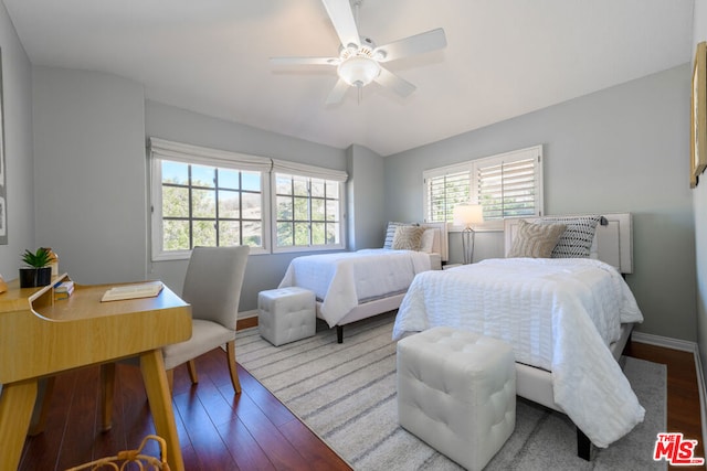 bedroom featuring ceiling fan and hardwood / wood-style flooring