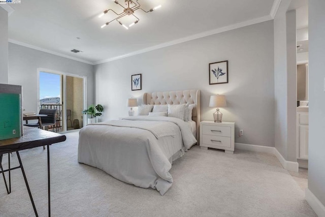 carpeted bedroom featuring access to outside, an inviting chandelier, connected bathroom, and ornamental molding