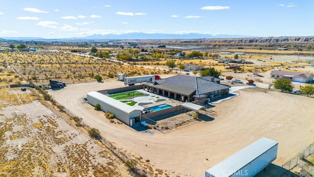 drone / aerial view featuring a mountain view