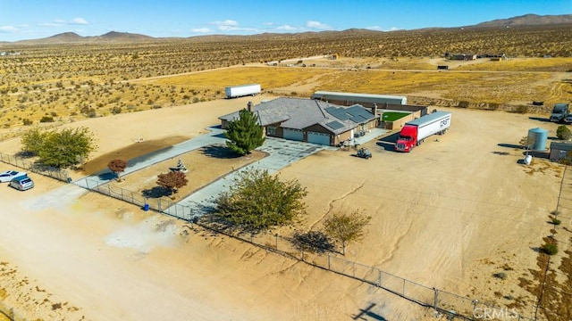 drone / aerial view featuring a mountain view