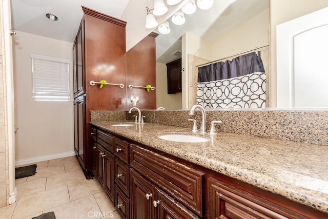 bathroom with vanity and tile patterned floors