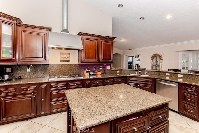 kitchen featuring light tile patterned flooring, stainless steel appliances, crown molding, and backsplash