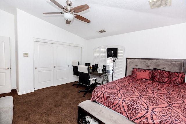 carpeted bedroom featuring ceiling fan, a closet, and lofted ceiling