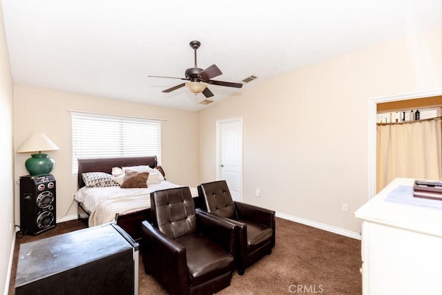 bedroom featuring ceiling fan, vaulted ceiling, and dark carpet