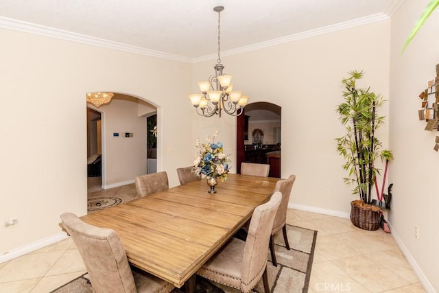 tiled dining space with an inviting chandelier and ornamental molding