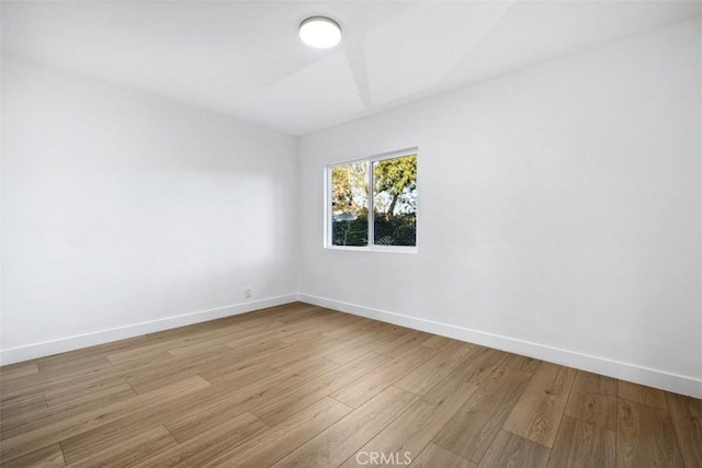 empty room with light wood-type flooring