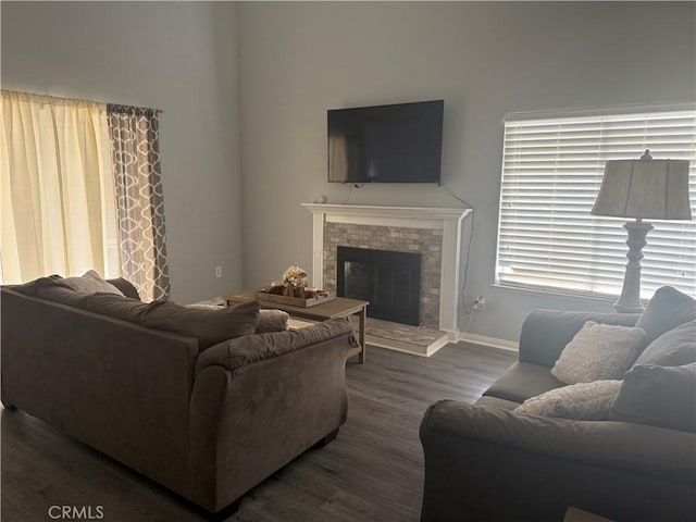 living room with dark wood-type flooring