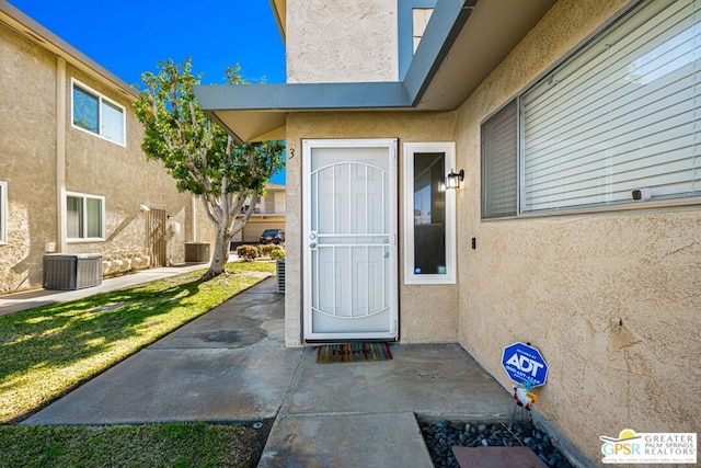 entrance to property with central air condition unit