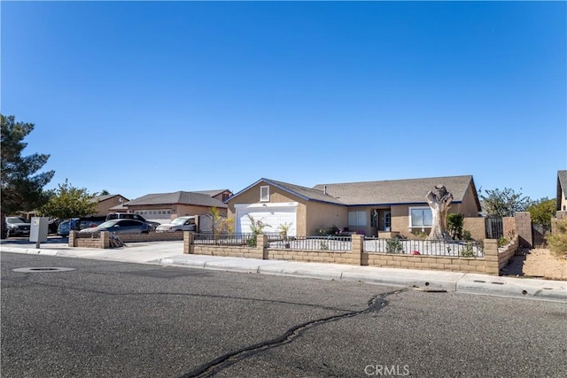 ranch-style house featuring a garage