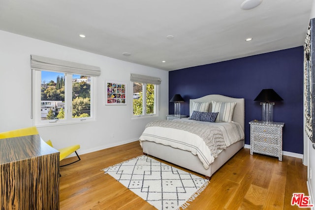 bedroom featuring wood-type flooring