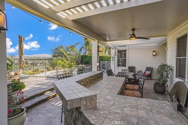 view of patio with ceiling fan