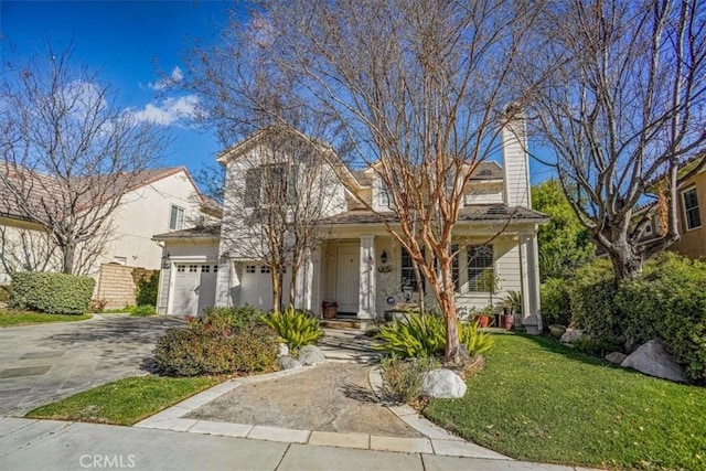 view of front of home featuring covered porch and a front lawn