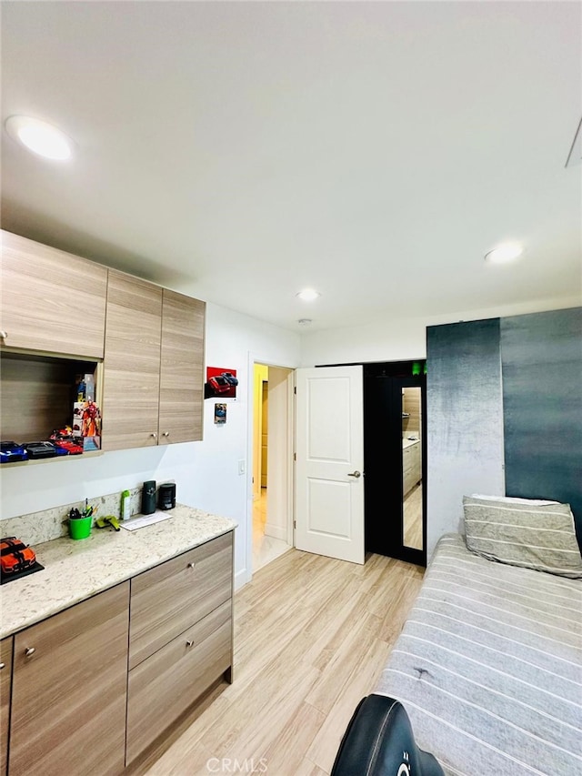 bedroom featuring light hardwood / wood-style flooring