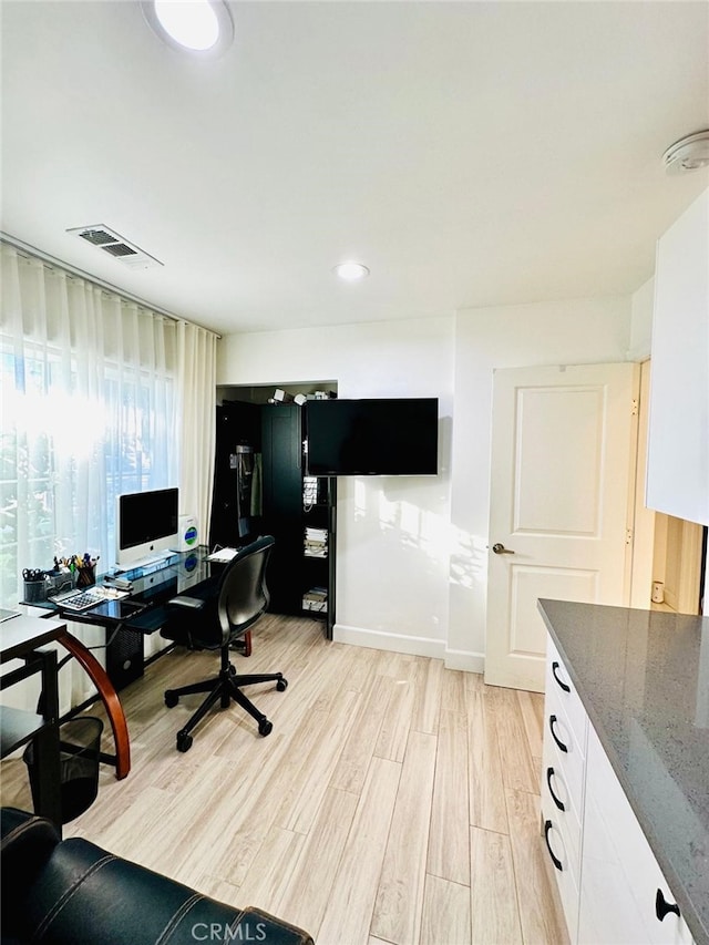 office featuring light hardwood / wood-style flooring