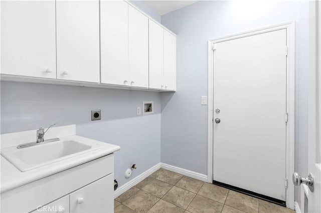 washroom with gas dryer hookup, hookup for a washing machine, cabinet space, electric dryer hookup, and a sink