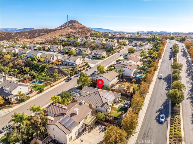 aerial view featuring a mountain view and a residential view