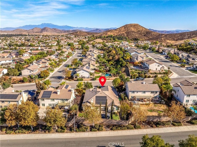 aerial view with a mountain view and a residential view