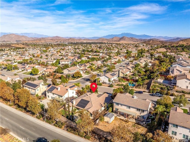 birds eye view of property featuring a mountain view and a residential view