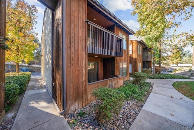 view of property exterior with a balcony