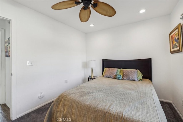 carpeted bedroom with ceiling fan