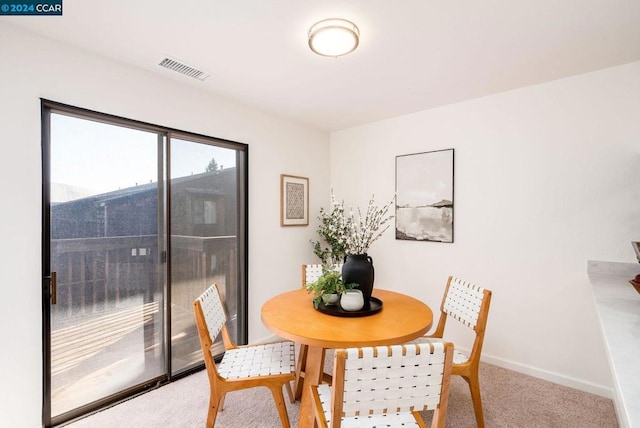 dining room with carpet