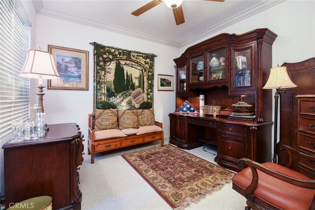 office with light carpet, ceiling fan, and ornamental molding