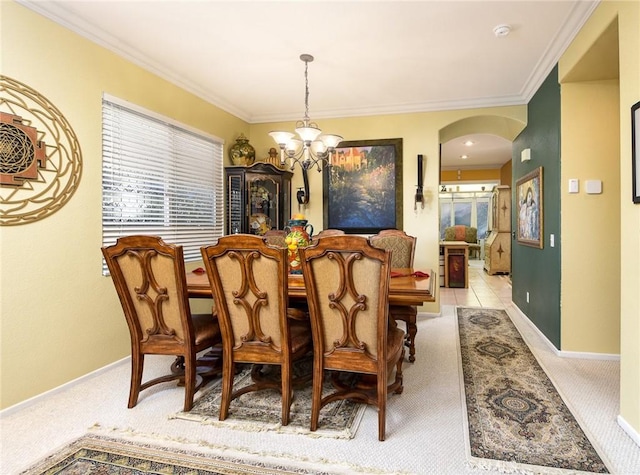 dining area with light colored carpet, a chandelier, and ornamental molding