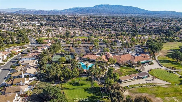 birds eye view of property featuring a mountain view