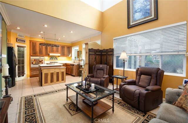 tiled living room featuring sink and ornamental molding