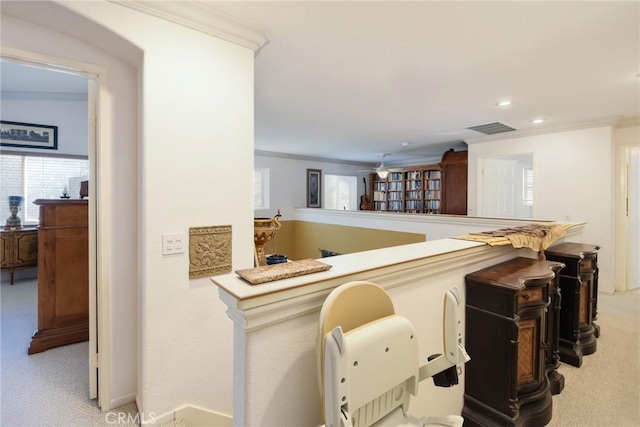 bar with light colored carpet and crown molding