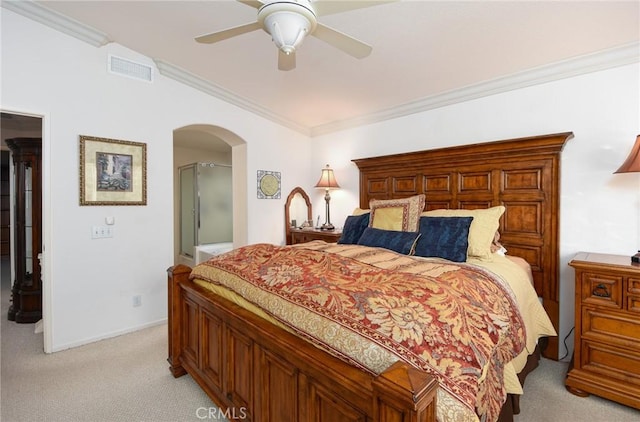 carpeted bedroom featuring ceiling fan and crown molding