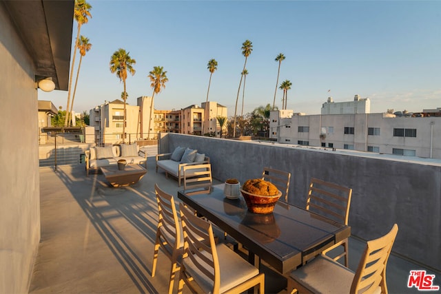 view of patio / terrace featuring outdoor lounge area and a balcony