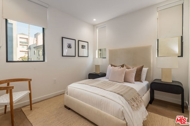 bedroom featuring light hardwood / wood-style floors