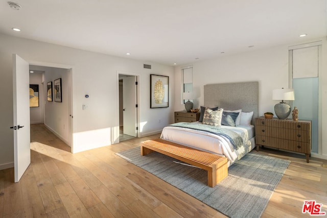 bedroom featuring light wood-type flooring