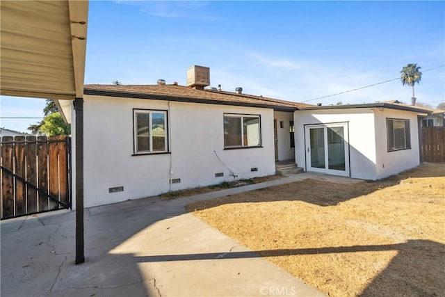 rear view of property featuring a patio