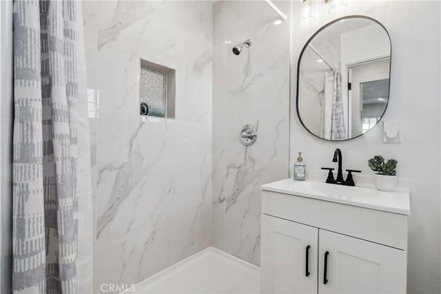 bathroom with vanity and a shower with curtain