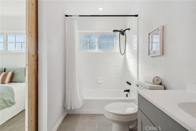 full bathroom featuring toilet, shower / tub combo, tile patterned floors, and vanity