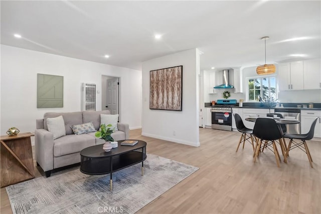 living room with light hardwood / wood-style flooring