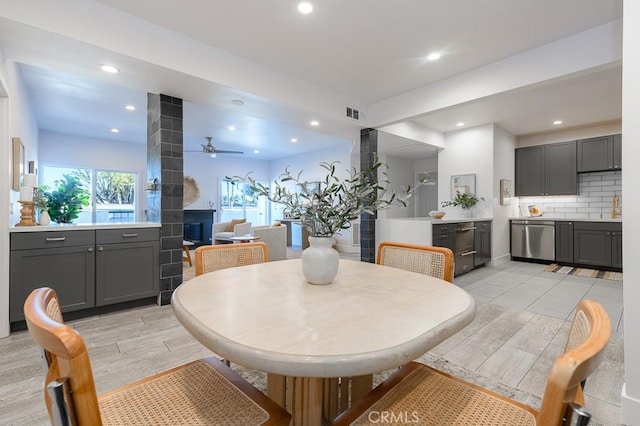 dining room featuring ceiling fan