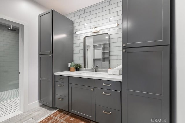 bathroom with vanity and walk in shower