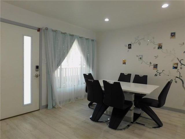 dining area featuring recessed lighting and light wood-type flooring