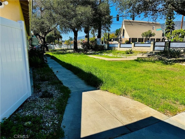 view of yard with fence