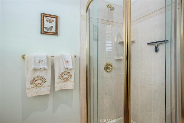 bathroom featuring a stall shower