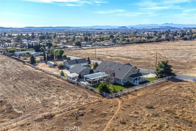 birds eye view of property featuring a residential view and a mountain view